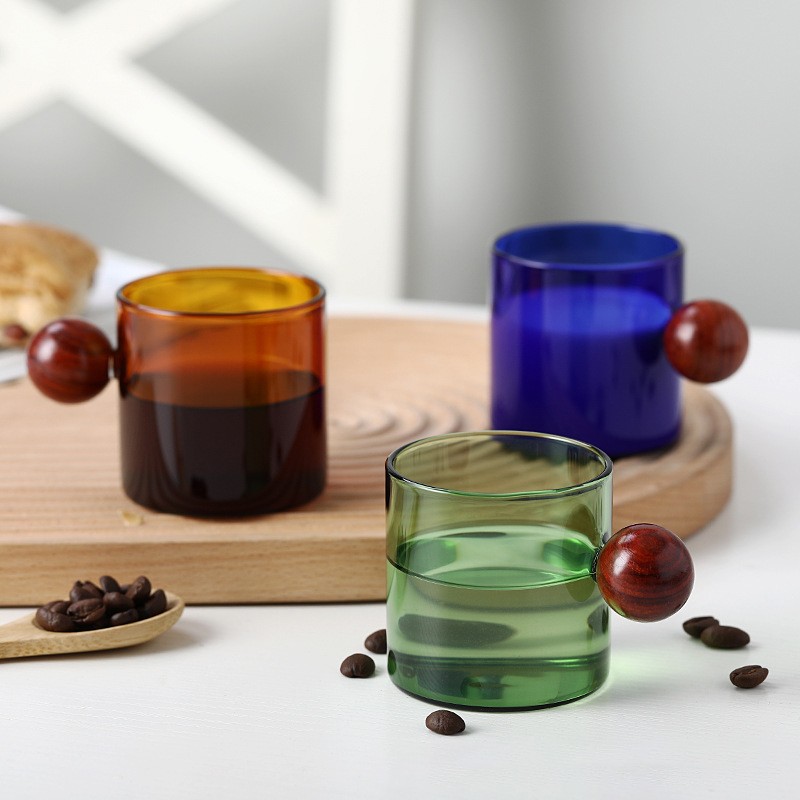 Tazza da caffè creativa colorata con manico a sfera in legno